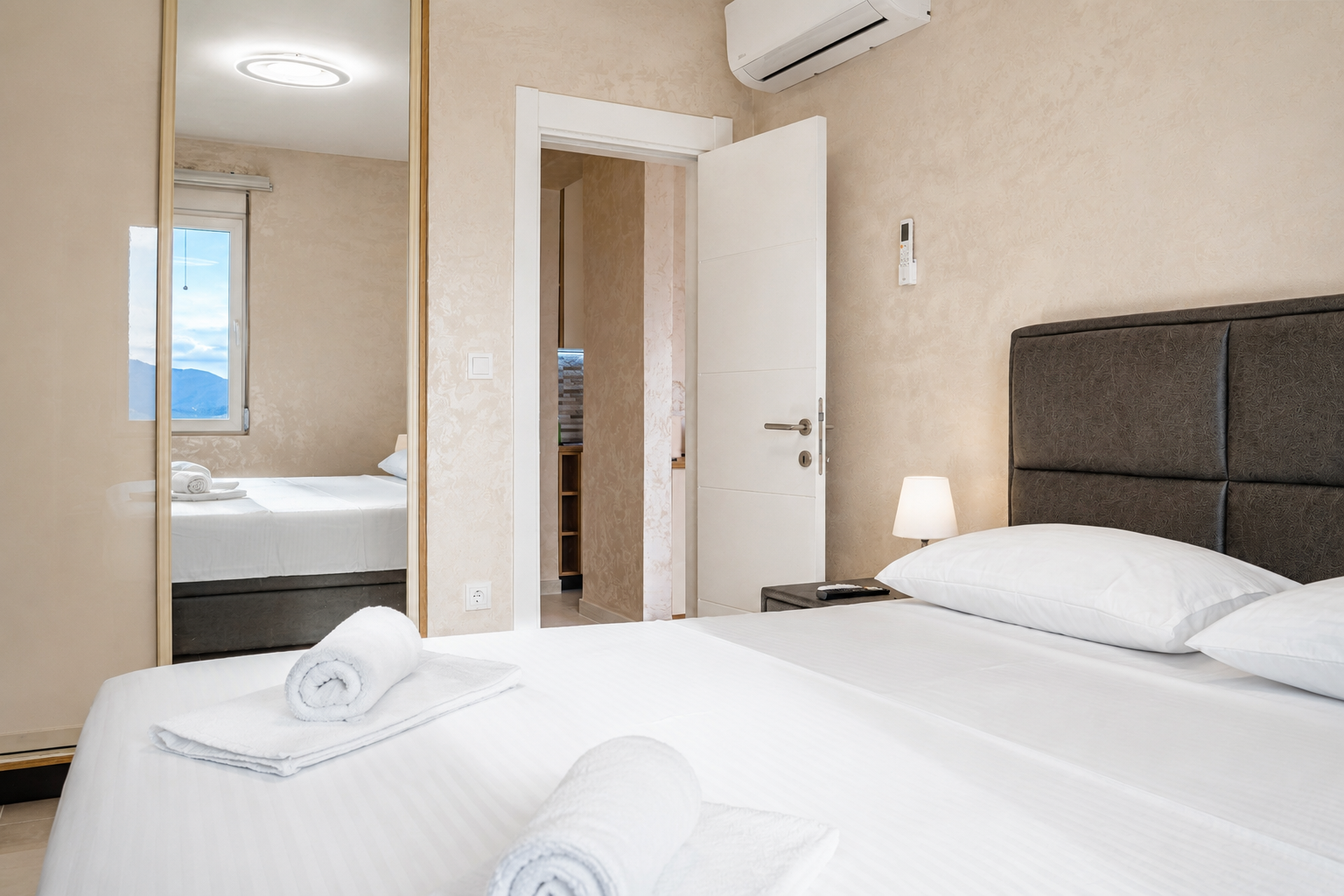 Minimalist bedroom at Dorado Apartments