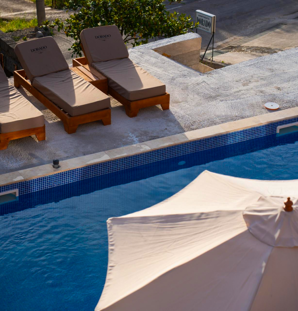Pool lounger with Dorado branding